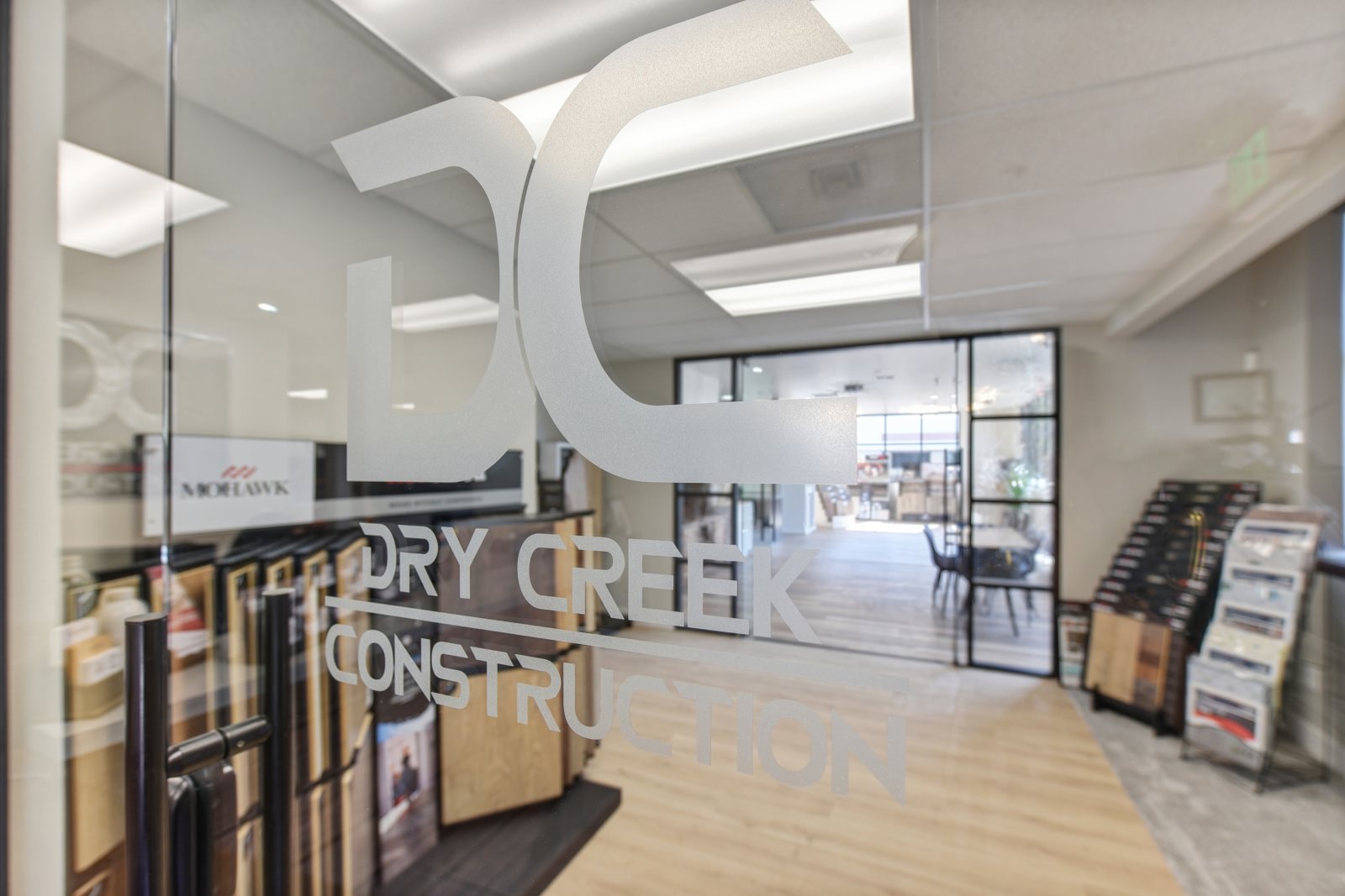 Dry Creek Construction's showroom featuring various flooring types